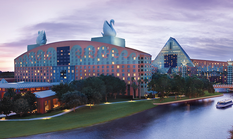 Exterior view of the Walt Disney World Swan and Dolphin Resort at sunset